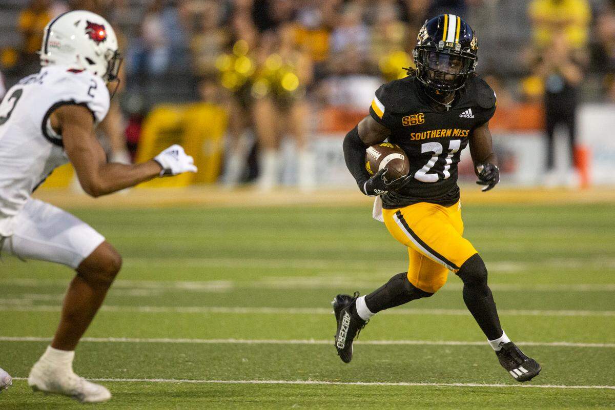 Southern Miss Golden Eagles wide receiver Tiaquelin Mims (21) runs the ball during a game against Arkansas State at M.M. Roberts Stadium in Hattiesburg on Saturday, Oct. 15, 2022.