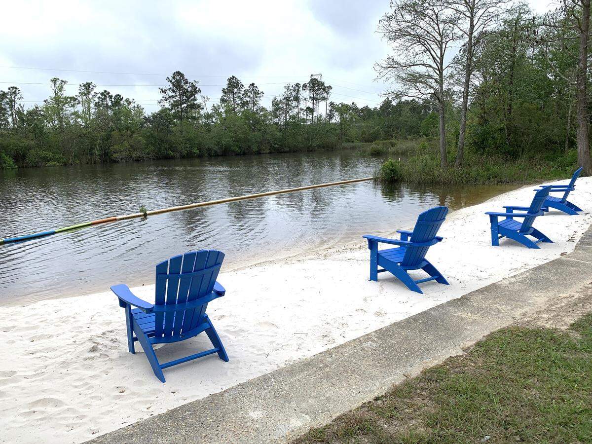 A sand beach is another place to sit and sip at Pier 15 on the Biloxi River. A beach volleyball court is still to come.
