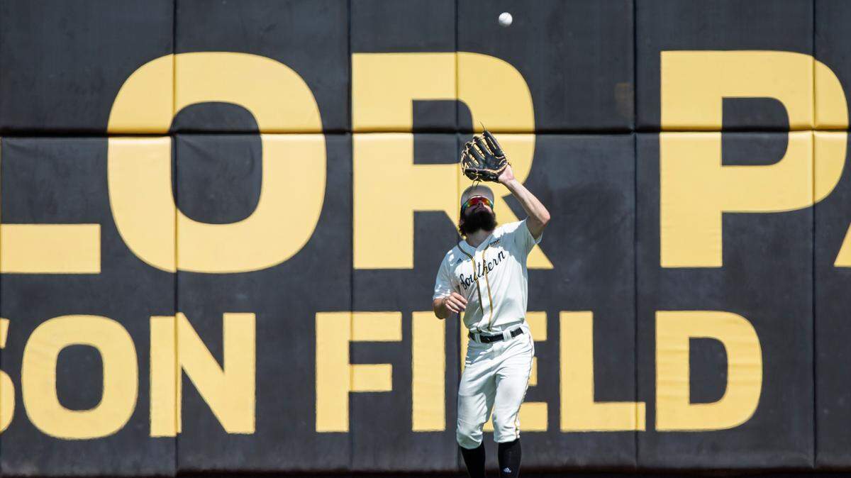 Southern Miss’ Matthew Etzel catches a ball in the outfield during the first game of a double header against Georgia Southern at Pete Taylor Park on Saturday, March 25, 2023.