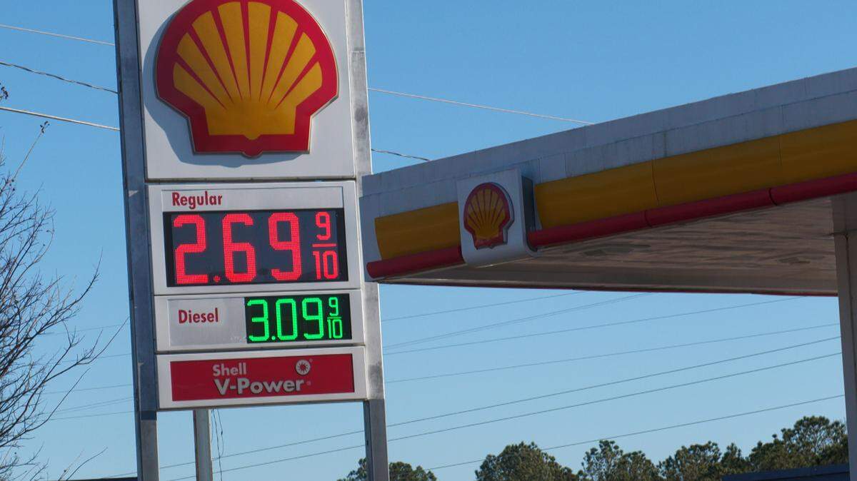 A gas station sign in Hattiesburg displays prices on Jan. 24.