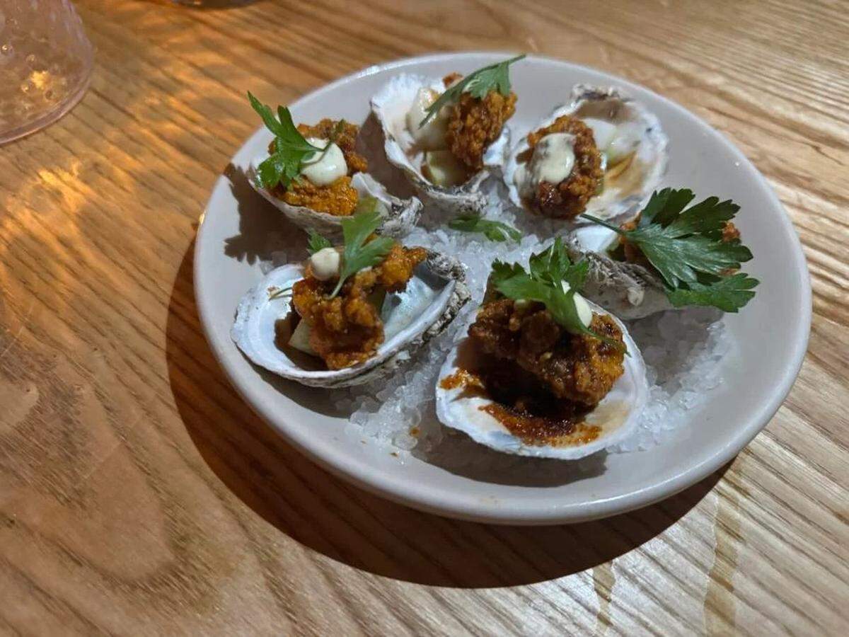 The Biloxi Hot oysters by Chef Austin Sumrall for a pop-up at Mr. Mao in Uptown on July 22, 2024.