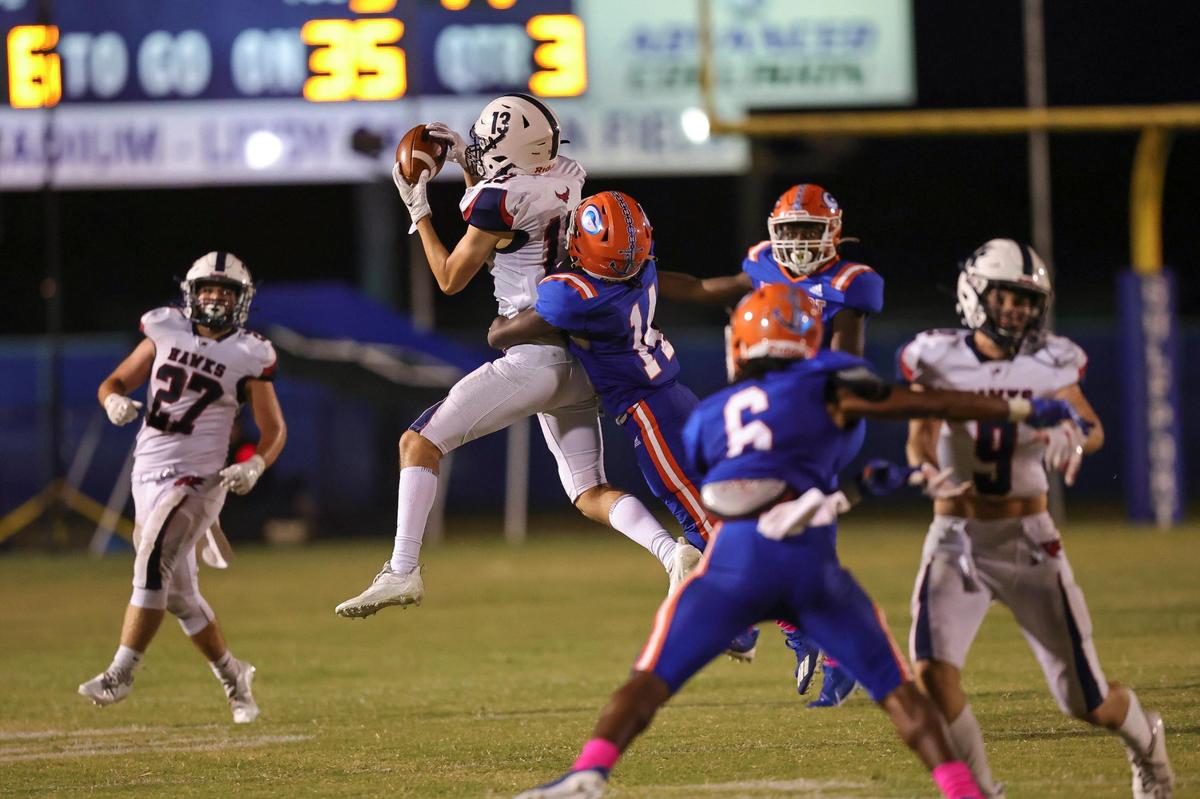 Hancock Hawks Todd Dedeaux (13) goes up for a pass reception during the game between Hancock and Gulfport at Milner Stadium, Gulfport, Mississippi, October 8, 2021.