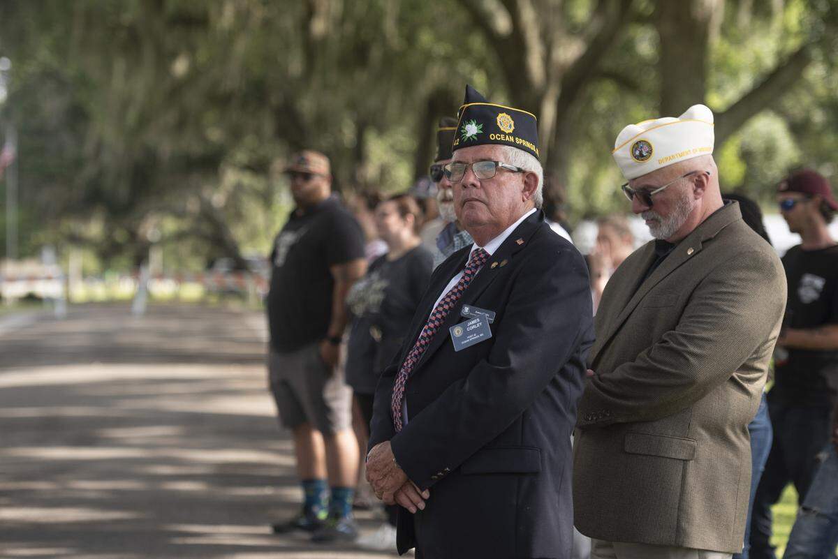 Veterans attend a Memorial Day ceremony at Biloxi National Cemetery in Biloxi on Monday, May 26, 2025.