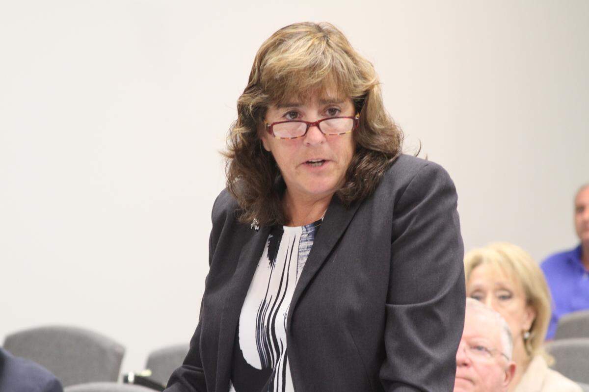 Clinical psychologist Julie Teater, who handles involuntary commitments, tells the Harrison County Board of Supervisors that she stands by her statement that people will die unless community mental health services are restored.