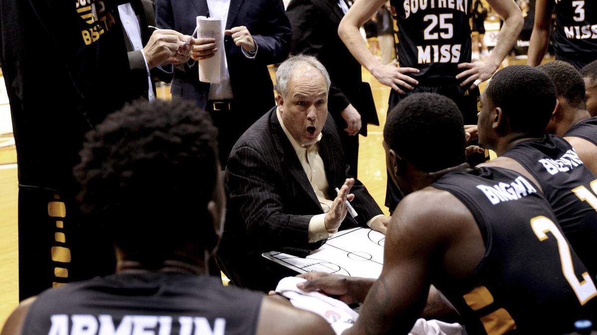 GEORGE CLARK/ASSOCIATED PRESS 
 Southern Miss coach Doc Sadler speaks to his team during a game last season in Hattiesburg. The Golden Eagles are 0-4 to start this season.