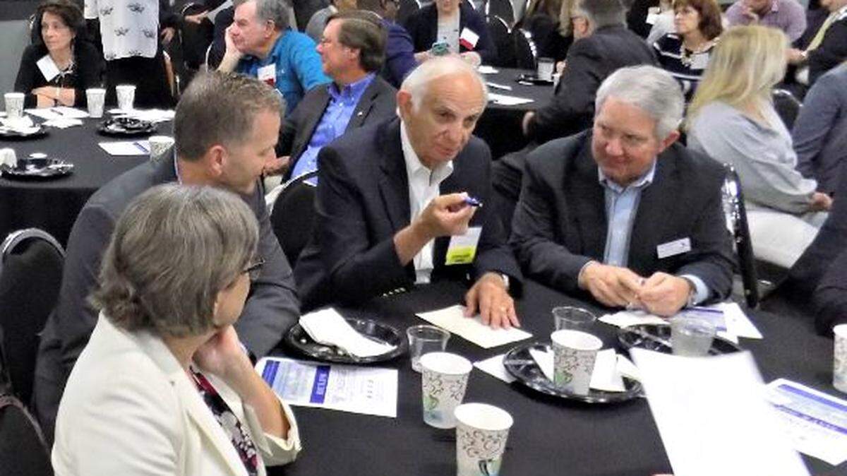 Jerry St. Pe, center, makes a point during a meeting of the Gulf Coast Business Council on Tuesday. Members rejected the House proposal for how to spend BP money awarded to the state.