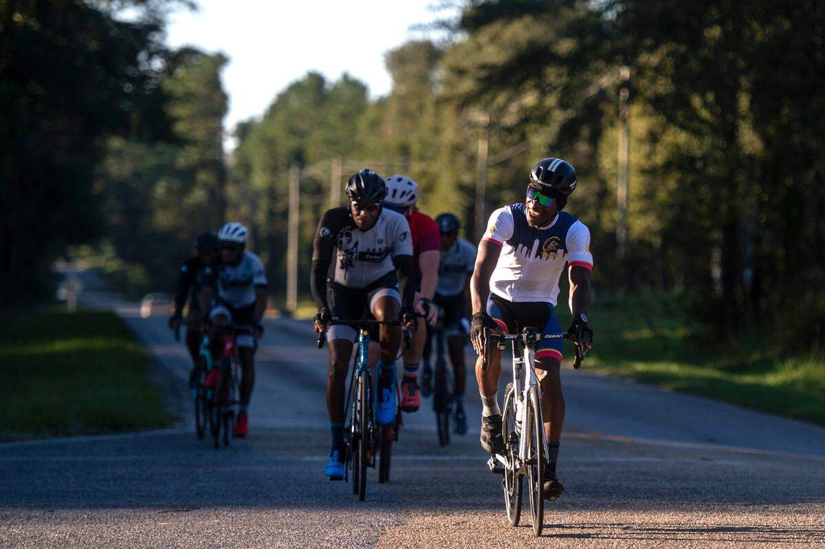 Members of Soul City Cycling, Bay Rollers, and the Major Taylor Cycling Club of Louisiana, bike in Woolmarket in this 2021 file photo. A new bike and walking trail in South Mississippi would give another option for cyclists and families.