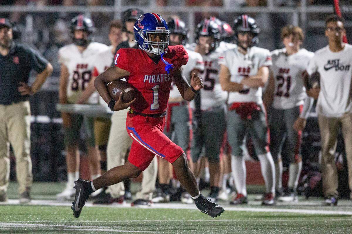 Pass Christian’s Paris Trivillion runs the ball during a game between Pass Christian and St. Stanislaus at Francis McDonald Stadium in Pass Christian on Friday, Sept. 20, 2024.
