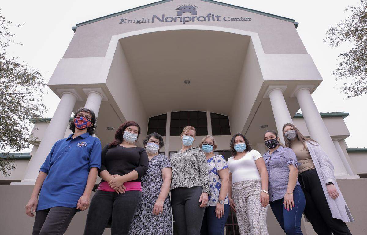 The Magnolia Medical Foundation ia a nonprofit that works to address health disparities in Mississippi. At the Biloxi office, Mireya Alexander (far left) and volunteers help connect Latino immigrants to health care.