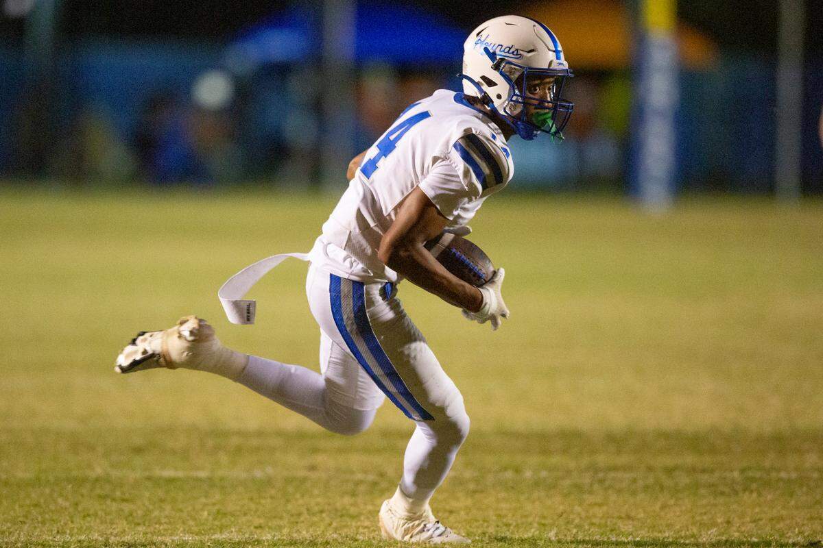 Ocean Springs’ Nolan Wells runs the ball down the field during a game against Gulfport at Milner Stadium in Gulfport on Friday, Oct. 27, 2023. Ocean Springs beat Gulfport 30-7.