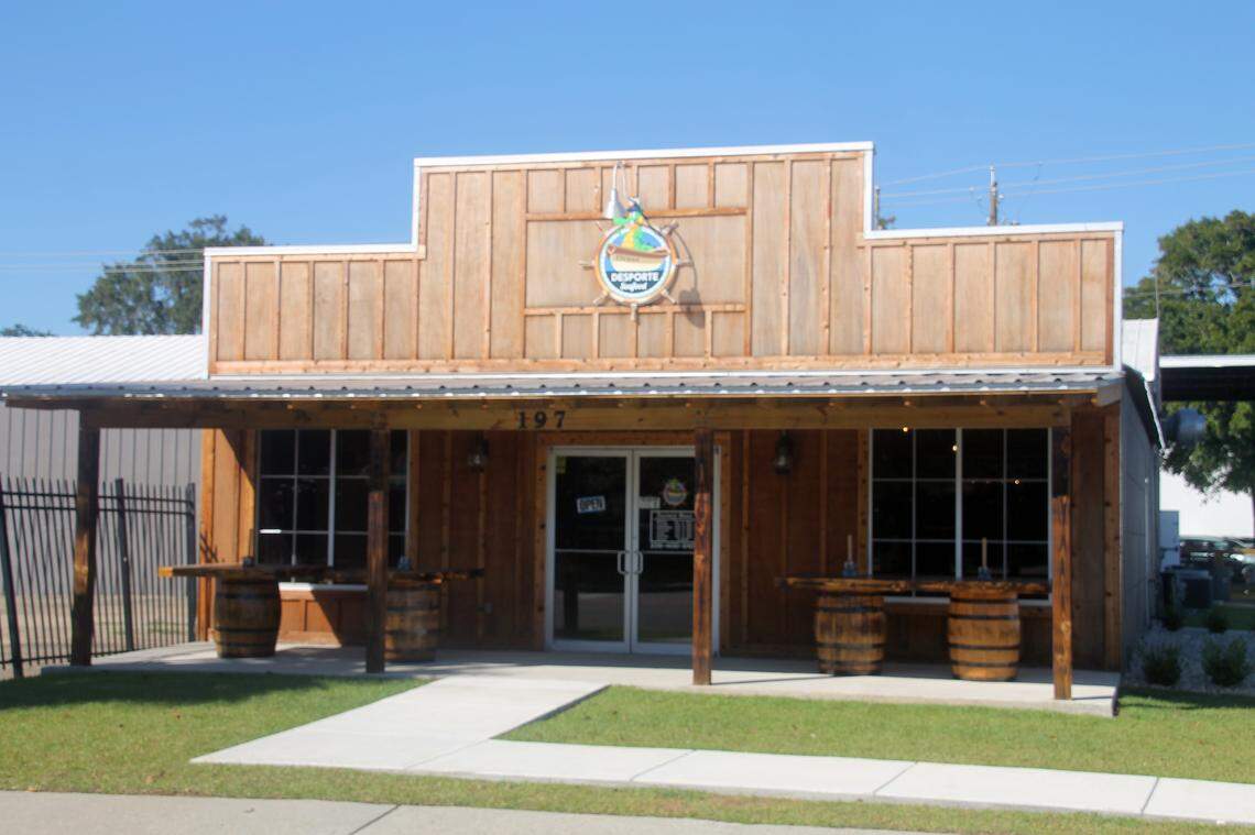 You can’t miss the new location of Desportes Seafood & Cafe on Caillavet Street in Biloxi, just look for the big wooden water tower.