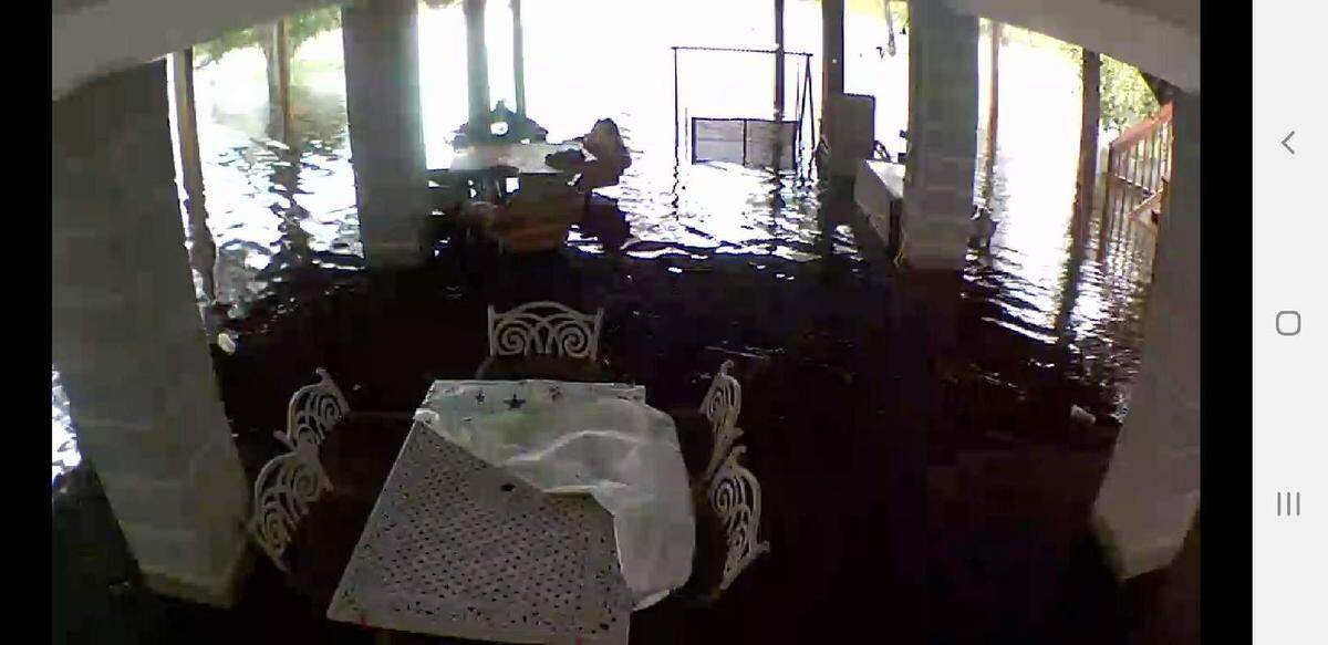 Dolly Lee of Jourdan River Shores community in Kiln reported more than 2 feet of storm surge at her home before Hurricane Ida made landfall.