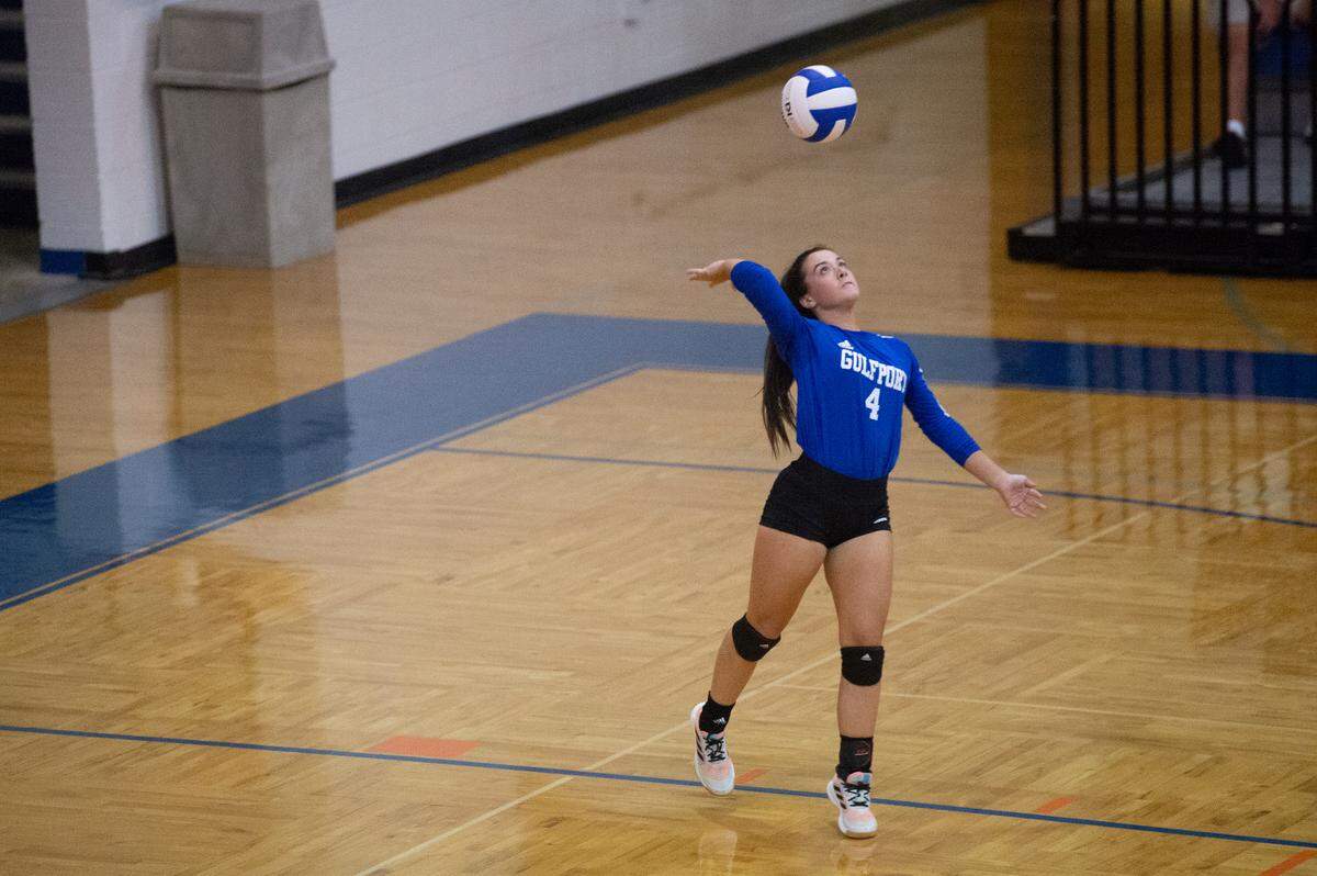 Gulfport’s Anna Kate Rounsaville serves the ball during a volleyball match against Ocean Springs at Gulfport High School in Gulfport on Tuesday, Oct. 4, 2022.