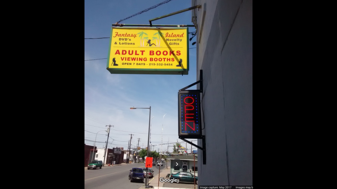 The owner of Fantasy Island adult bookstore said business is booming after President Donald Trump’s campaign held a news conference at the Four Seasons landscaping business next door.