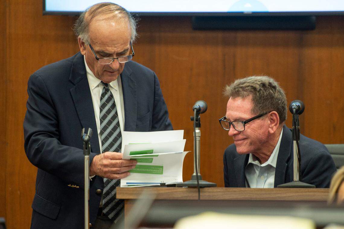 Cliff Kirkland smiles as his lawyer shows him text messages that are evidence during Kirkland’s trial for allegedly molesting underage girls in Harrison County Circuit Court in Biloxi on Tuesday, May 17, 2022.