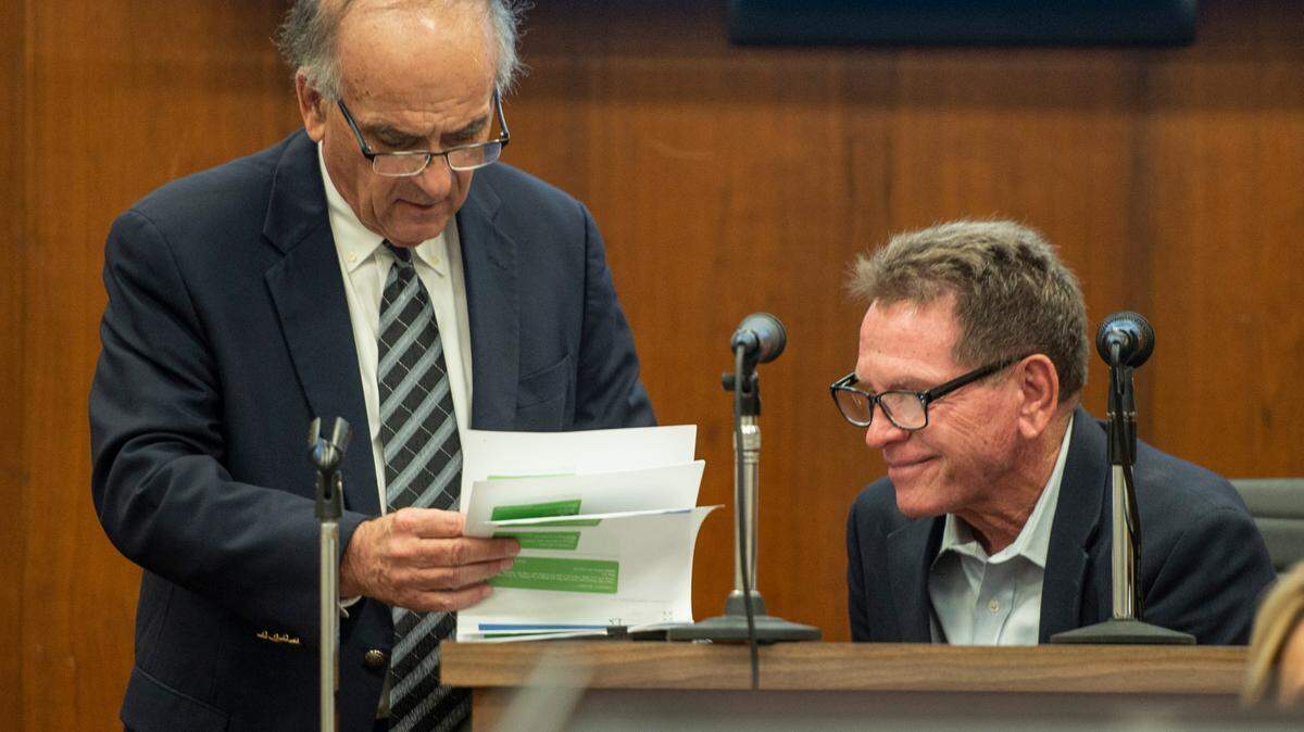 Cliff Kirkland smiles as his lawyer shows him text messages that are evidence during Kirkland’s trial for allegedly molesting underage girls in Harrison County Circuit Court in Biloxi on Tuesday, May 17, 2022.