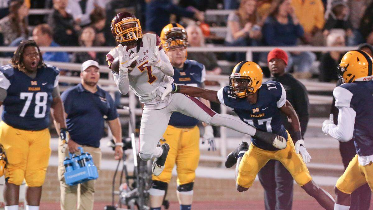 Pearl River receiver Latreal Jones pulls in a 62-yard pass as Gulf Coast’s Terrance Newell (17) defends during the Wildcats’ 25-3 loss at Gulf Coast on Thursday, Oct. 17, 2019 at A.L. May Memorial Stadium in Perkinston, Miss.
