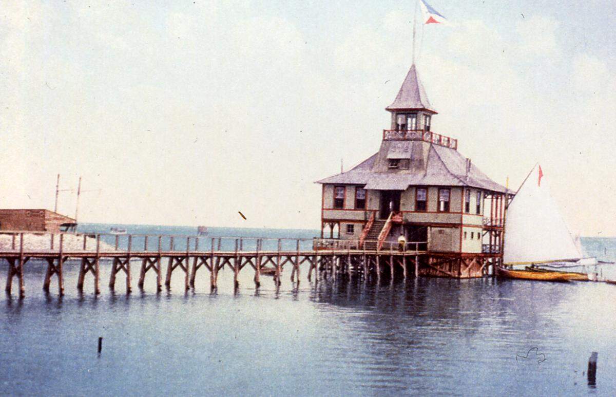 The first Biloxi Yacht Club was built in 1901, and destroyed in a hurricane 14 years later. This postcard is circa 1910.