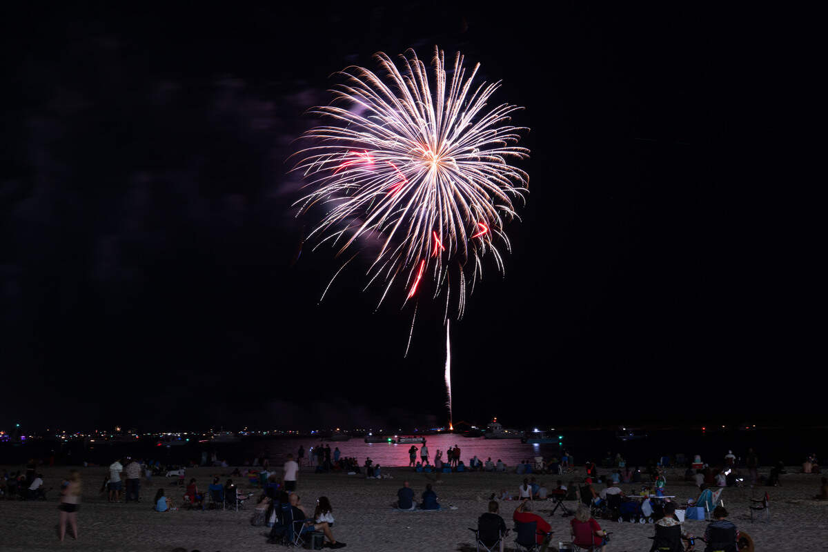 Fireworks are shot into the air during the annual show over the Mississippi Sound on Saturday, July 4, 2026.