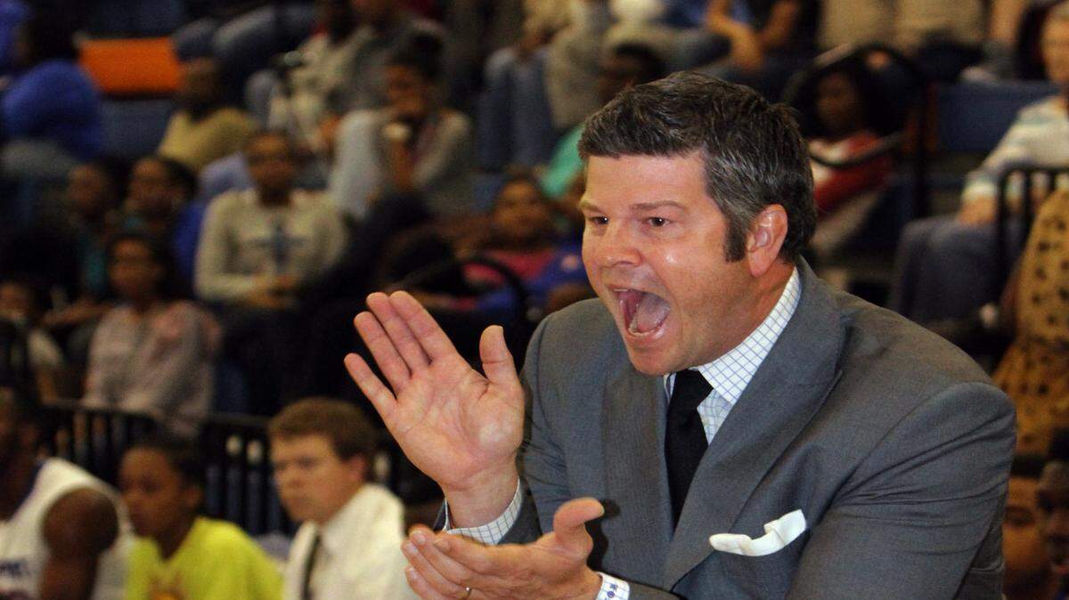 JOHN FITZHUGH/SUN HERALD 
 Gulfport head coach Owen Miller leads the Admirals against Harrison Central in the Admiral Hardwood Holiday Classic on Monday.