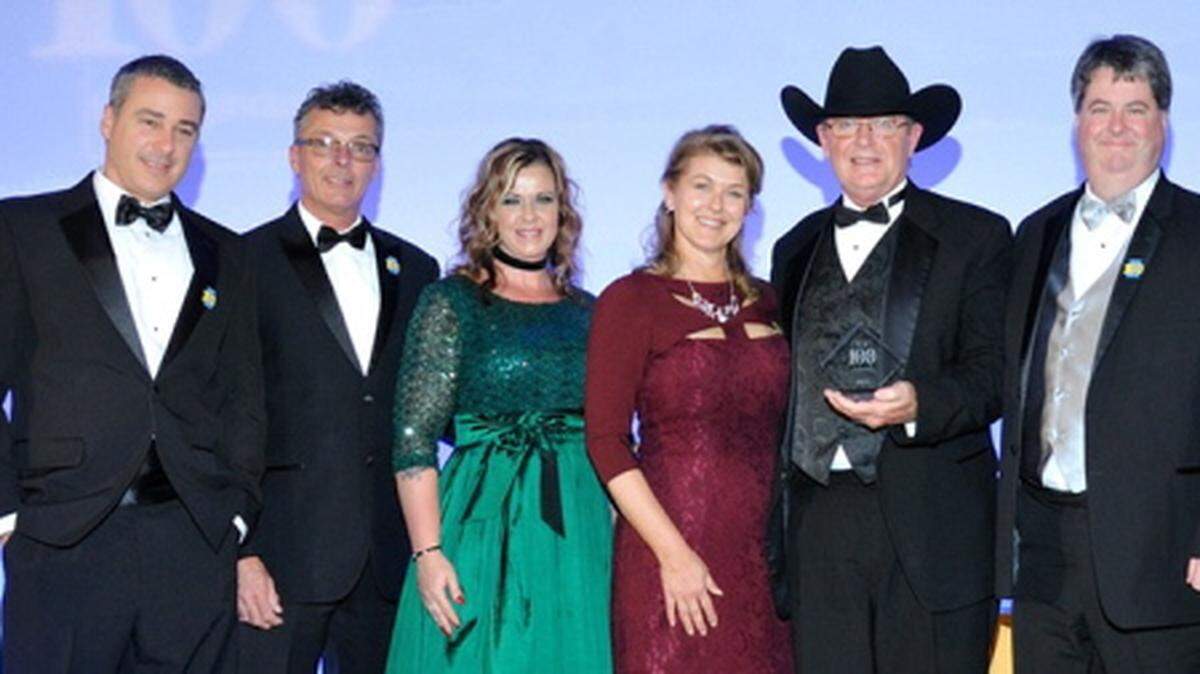 COURTESY OCEAN MARINE 
 Members of the staff of Ocean Marine in Ocean Springs accept the award for the Top 100 dealers in North America by Boating Industry. From left are: Lance Miller, Russ Jennings, Terri Jennings, Jamie King, Keith King and Jeff Lloyd.