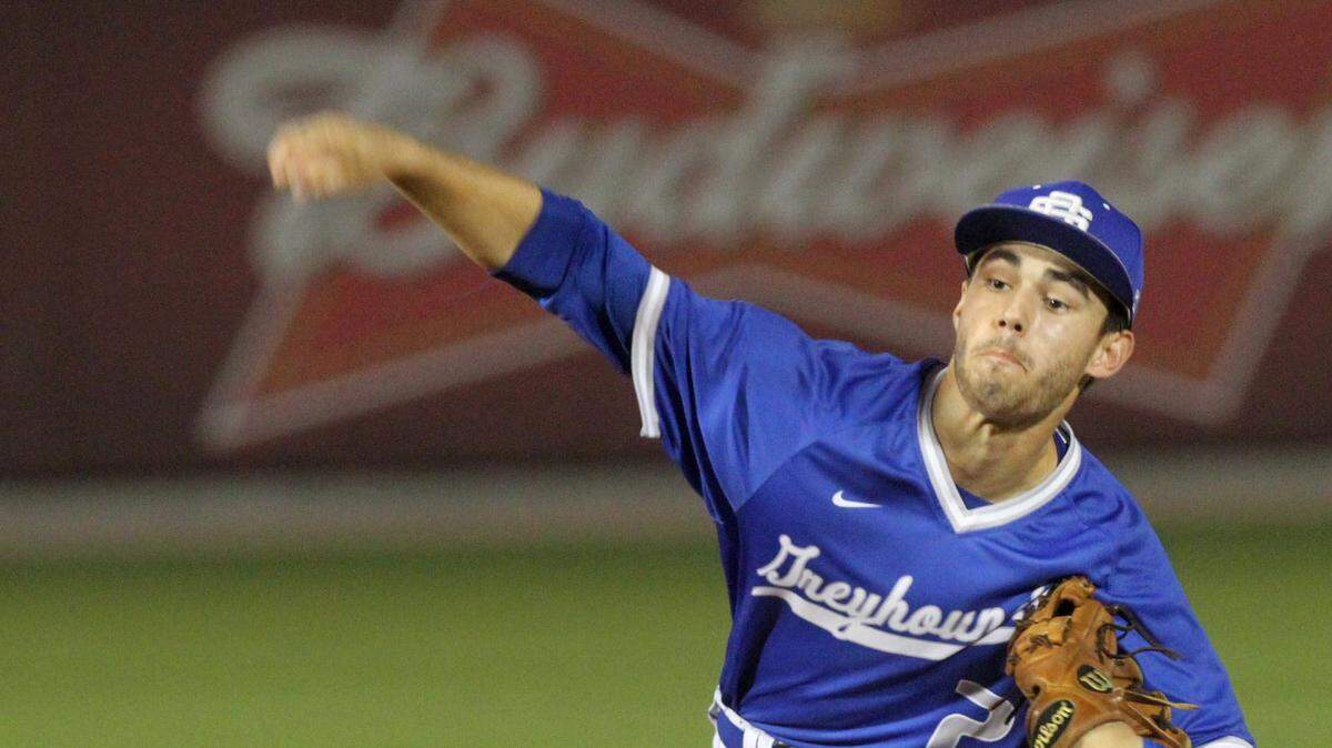 JOHN FITZHUGH/SUN HERALDOcean Springs pitcher Cooper Brune throws against Gulfport during the first inning of their game at MGM Park in Biloxi on March 17. Brune ended up a homer shy of the cycle. The game was completed Friday.