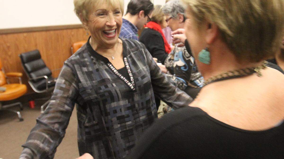 JOHN FITZHUGH/SUN HERALD 
 Harrison County Circuit Clerk Gayle Parker greets Kate Howell of the District Attorney's office at Parker's retirement party at the county courthouse in Gulfport on Thursday Dec. 17, 2015.
