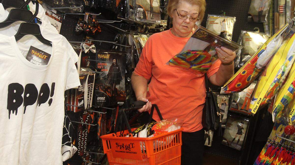 JOHN FITZHUGH/SUN HERALD 
 Shelia Atkins of D'Iberville shops at Spirit Halloween at Edgewater Village in Biloxi on Wednesday Oct. 7, 2015.