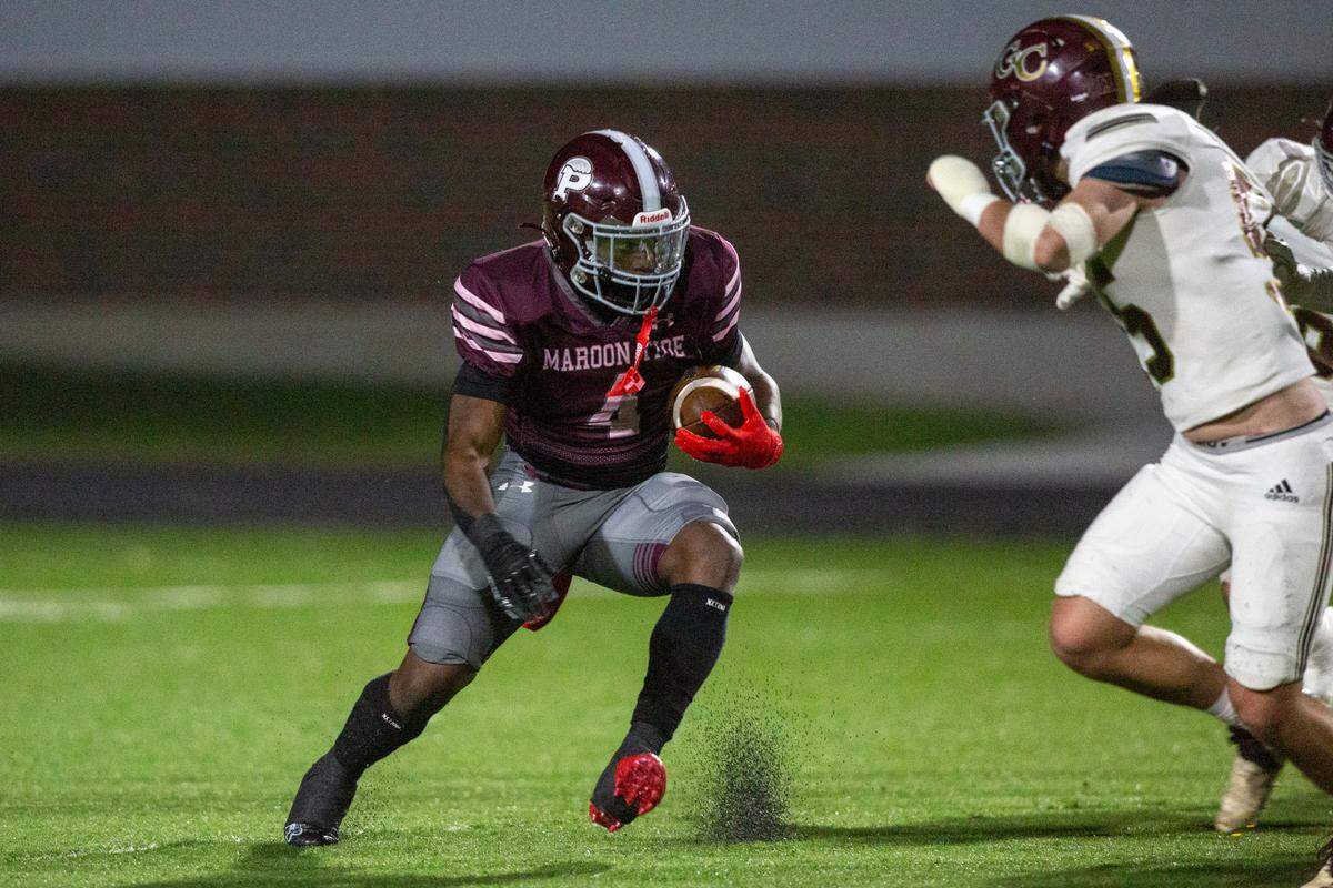 Picayune’s Darrell Smith runs the ball during a playoff game between Picayune and George County at Lee-Triplett Stadium in Picayune on Friday, Nov. 22, 2024.