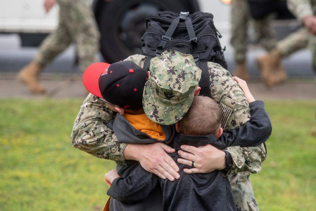 Members of Naval Mobile Construction Battalion 133 reunite with their families after returning from deployment at a homecoming event at the Naval Construction Battalion Center in Gulfport on Tuesday, March 5, 2024.