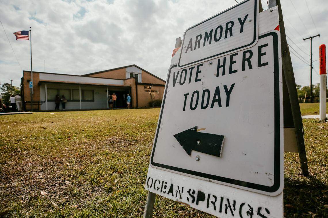 A sign outside of the Ryan Youth Center in Ocean Springs, Mississippi, directs residents to vote inside during the municipal primary elections April 6, 2021.