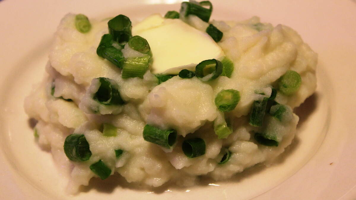 JULIAN BRUNT/SPECIAL TO THE SUN HERALD 
 Mashed potatoes and scallions make a sharp Irish Champ.