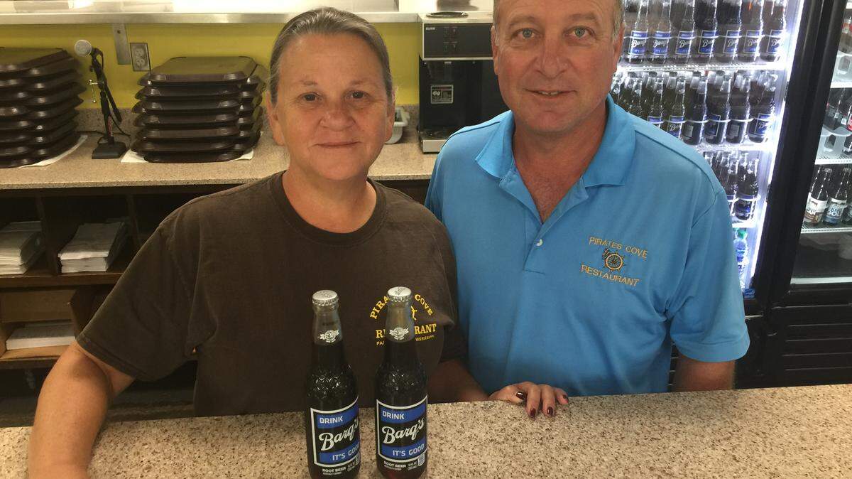 Dawn and Mike LaMarca sell more Barq’s root beer in the bottle at Pirate’s Cove in Pass Christian than anywhere else on the Coast ,except the Sam’s Club in Gulfport