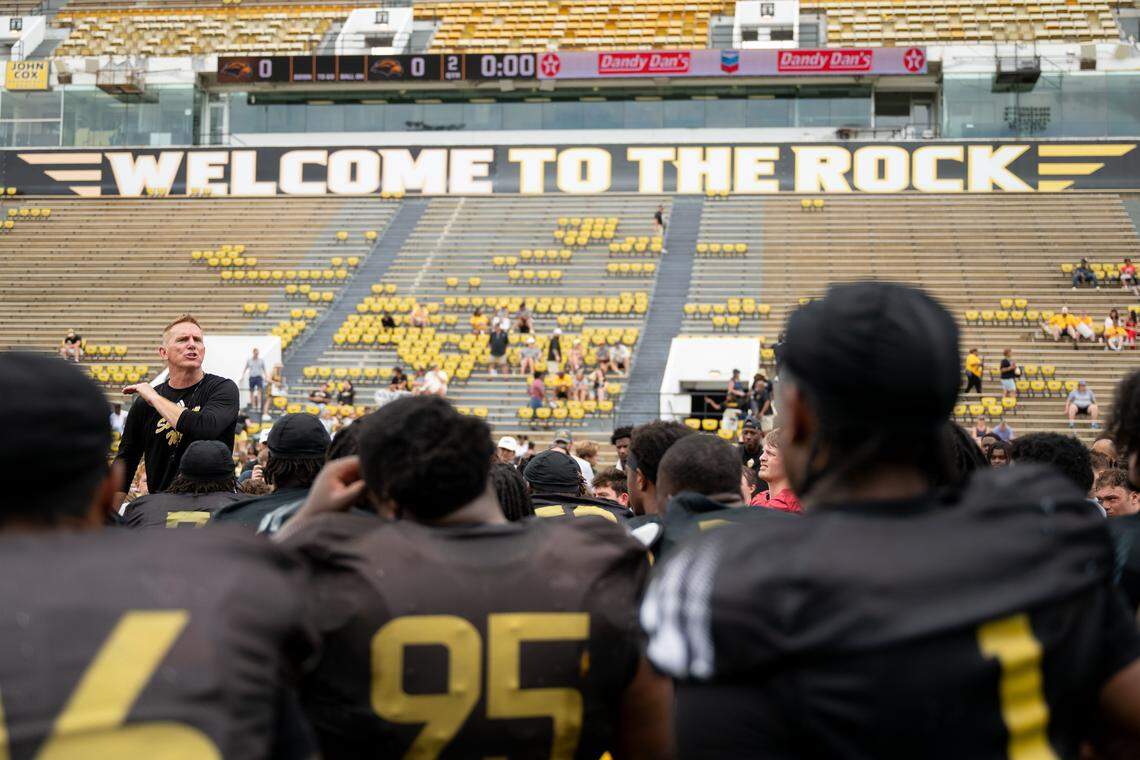 Southern Miss head coach Blake Anderson speaks with his players Saturday after the Southern Miss Spring Football Showcase at M. M. Roberts Stadium.