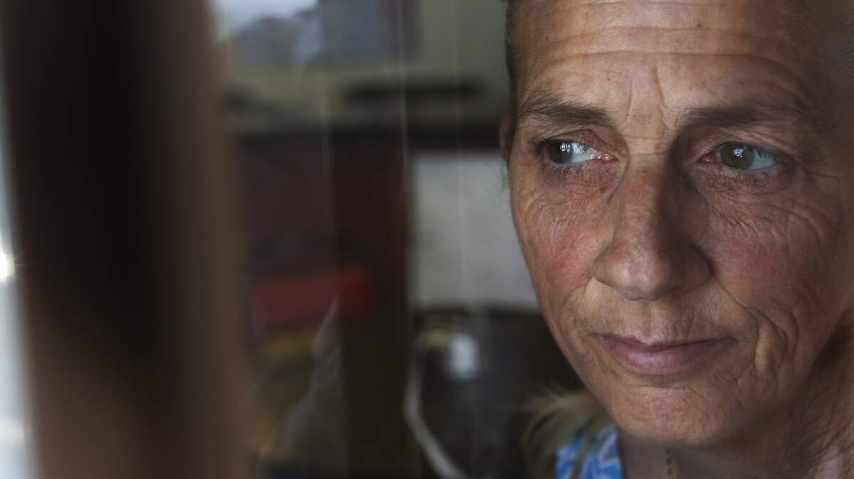 Cheryl Holbrook, a member of a group of protesters who opposed the conditional release of Christopher Hubbart, poses for a portrait on June 17, 2015 in Palmdale, Calif. (Anne Cusack/Los Angeles Times/TNS)