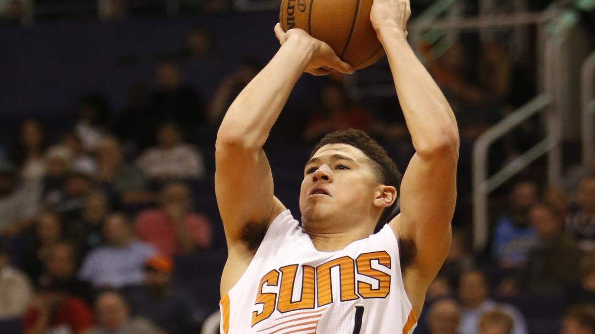 Phoenix Suns guard Devin Booker (1) in the third quarter during an NBA basketball game against the Utah Jazz, Saturday, Feb. 6, 2016, in Phoenix. The Jazz defeated the Suns 98-89. (AP Photo/Rick Scuteri)