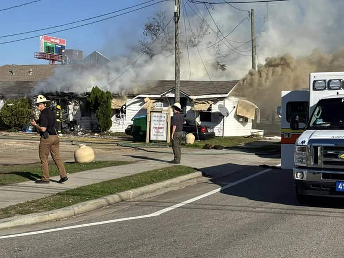 Smoke rises at Evergreen Apartments in Gulfport on Tuesday, Dec. 31, 2024, following an explosion. Three people were hurt, and the apartments were badly damaged.