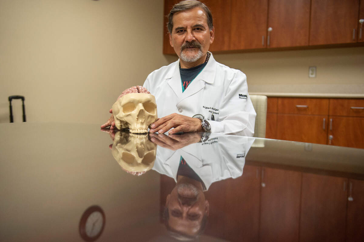 Dr. Miguel Melgar, a neurological surgeon specializing in minimally invasive surgery for brain tumors, poses for a portrait at Merit Health Hospital in Biloxi on Tuesday, July 26, 2022. Dr. Melgar performed a surgery on a patient, Brittney Le, in June, successfully removing her tumor and restoring her eyesight which was reduced by the tumor.