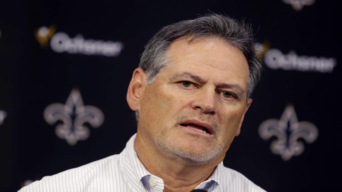 New Orleans Saints general manager Mickey Loomis speaks to reporters on the first day of reporting for training camp at their NFL football training facility in Metairie, La., Thursday, July 25, 2013. (AP Photo/Gerald Herbert)
