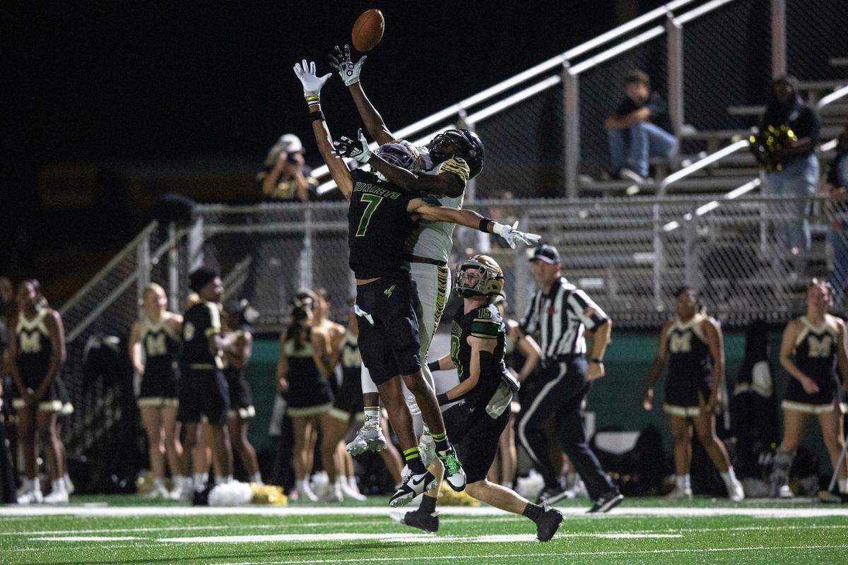 Poplarville’s Biggie Smith tries to intercept a pass during a playoff game between Poplarville and Mendenhall at Poplarville on Friday, Nov. 8, 2024.