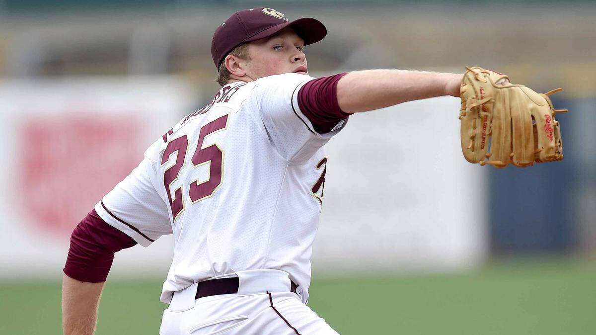 CHRIS TODD/SPECIAL TO THE SUN HERALD 
 George County pitcher Walker Robbins rears back to throw against Madison Central on Wednesday in the MHSAA State Baseball Championships at Trustmark Park in Pearl.