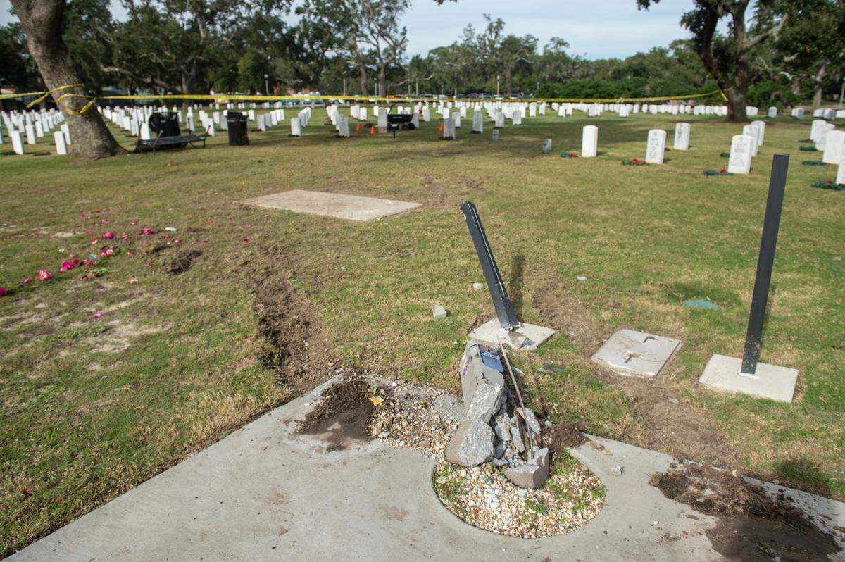 Damage caused by a pickup truck at Biloxi National Cemetery in Biloxi on Monday, Dec. 4, 2023, after the pickup truck ran over several sections of the cemetery on Sunday.