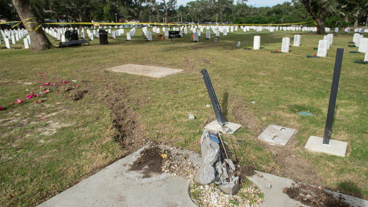 Damage caused by a pickup truck at Biloxi National Cemetery in Biloxi on Monday, Dec. 4, 2023, after the pickup truck ran over several sections of the cemetery.