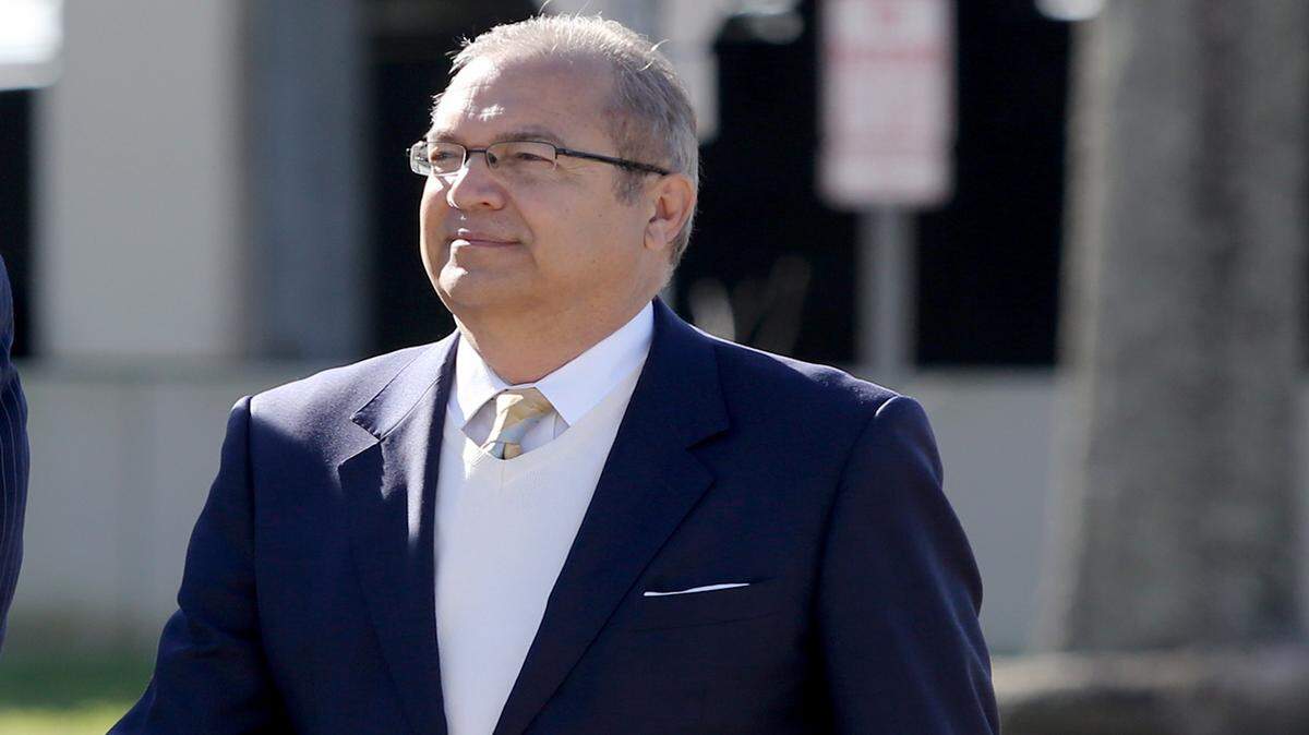 AMANDA McCOY/SUN HERALD 
 Eduardo Diaz arrives at the federal courthouse in Gulfport on Tuesday, March 22, 2016. Diaz plead guilty to wire fraud in a plea agreement with the government.