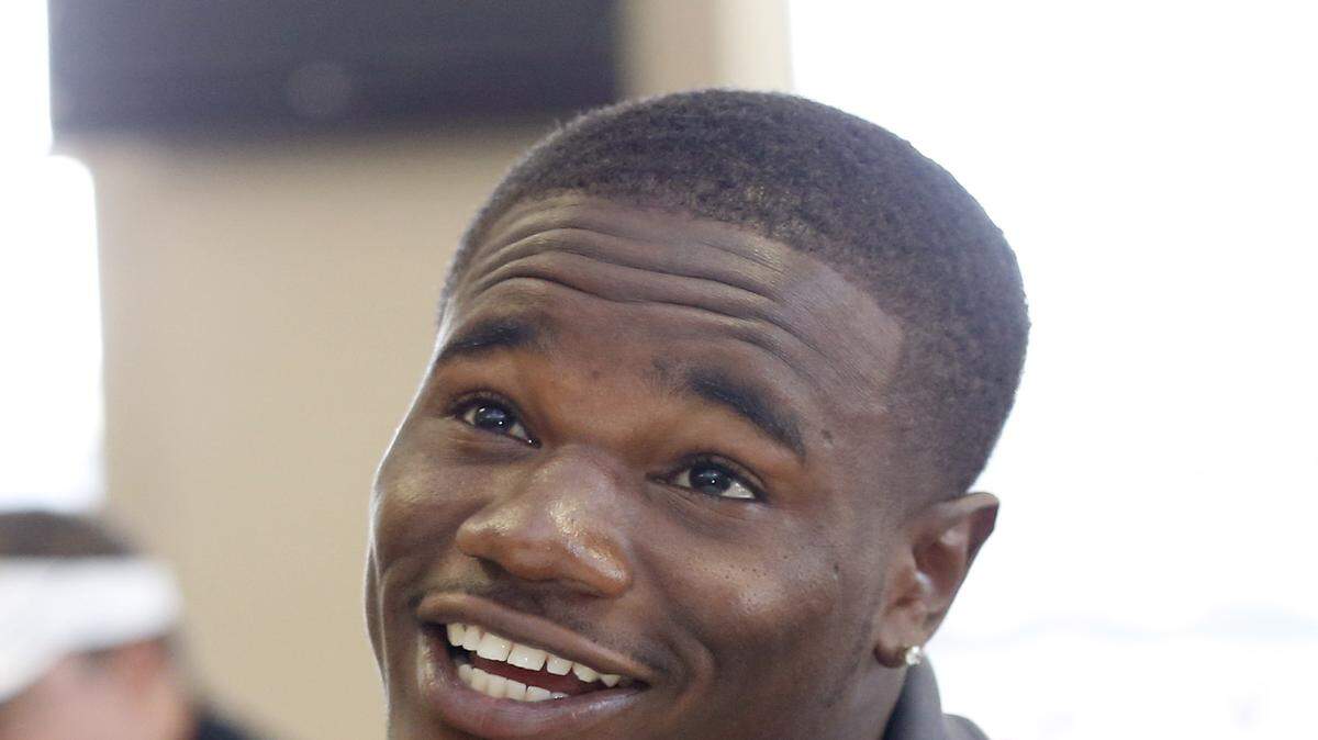 Southern Mississippi wide receiver Mike Thomas ponders a question as he discusses his summer training in preparation for this year's season during media day at the C-USA affiliated school in Hattiesburg, Miss., Saturday, Aug. 15, 2015. The Golden Eagles hope to improve on last year's 3-9 season. (AP Photo/Rogelio V. Solis)