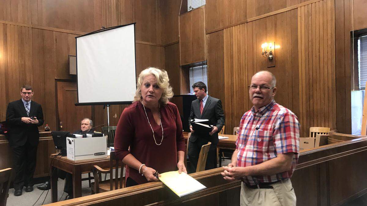 Carmon Brannon, center, became upset when a reporter tried to take her picture at her second trial in Vicksburg on Wednesday, July 25, 2018. She’s a former jail nurse accused in the death of a George County inmate.