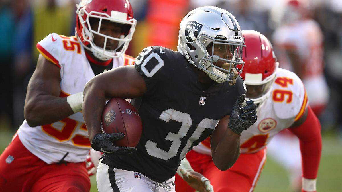 Oakland Raiders running back Jalen Richard (30) runs against the Kansas City Chiefs on Dec. 2, 2018.