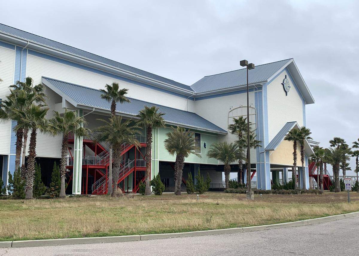 Crews have started work at the former Margaritaville casino in Biloxi, transforming it into a new dining and entertainment venue. Several sets of exterior stairs were restored and painted red,
