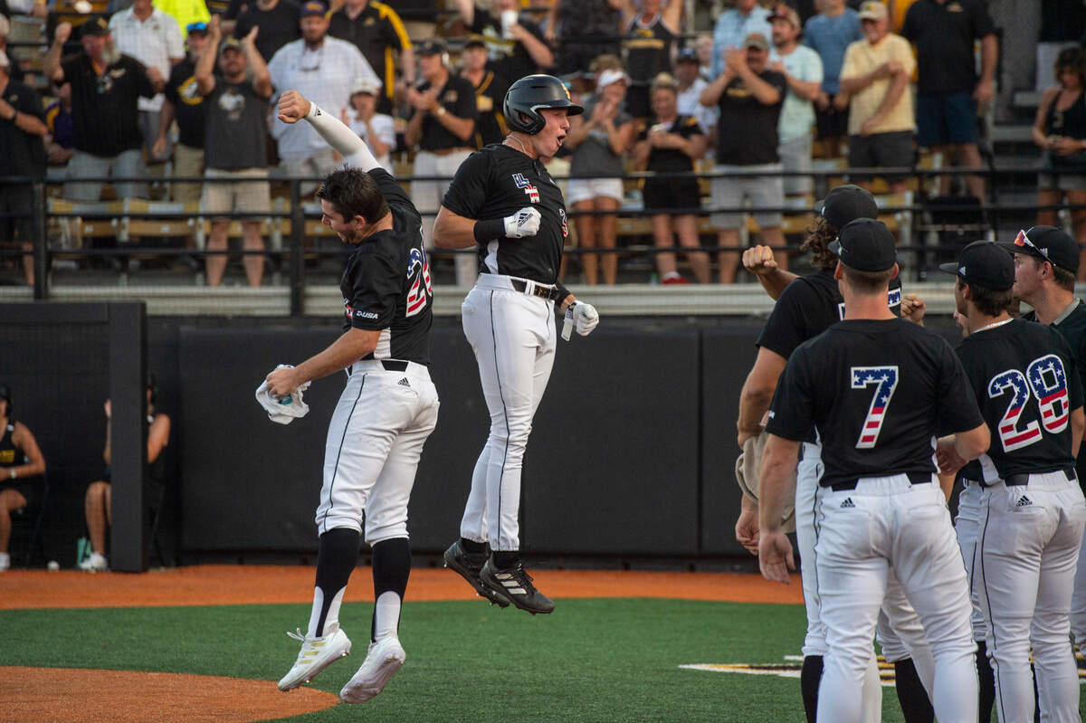 Southern Miss celebrates after scoring a run against LSU during Game Four of NCAA Regionals at Pete Taylor Park in Hattiesburg on Saturday, June 4, 2022.