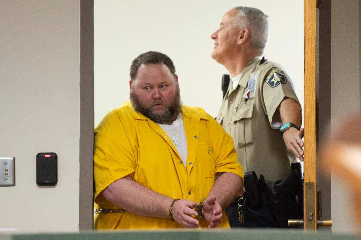 Joseph Leo Nangle enters a circuit courtroom in Jackson County on Tuesday, Oct. 22, 2024, for his sentencing in the deaths of Mary “Julie” Kelley and Elizabeth “Lisa” Kelley Conners.